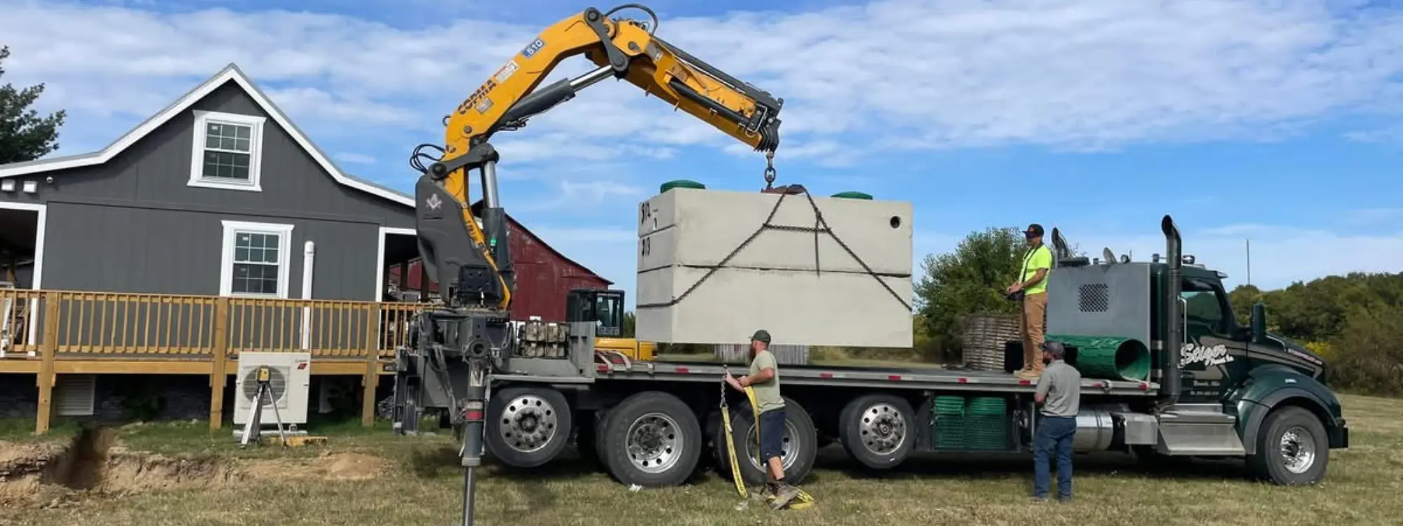 Stiger truck unloading a residential tank.