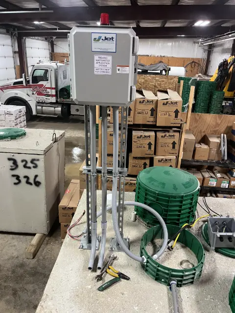 a tank with a dummy riser for wiring