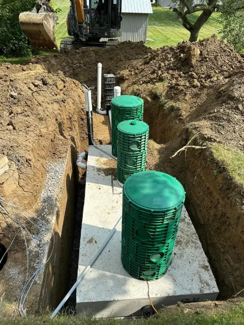 septic tank with added risers